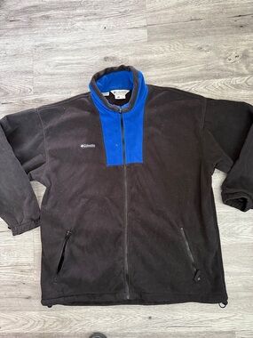 Columbia Men’s Black Fleece Jacket with Royal Blue Chest Panel